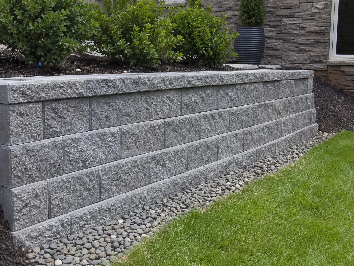 Reinforced Besser block retaining wall built in Auckland