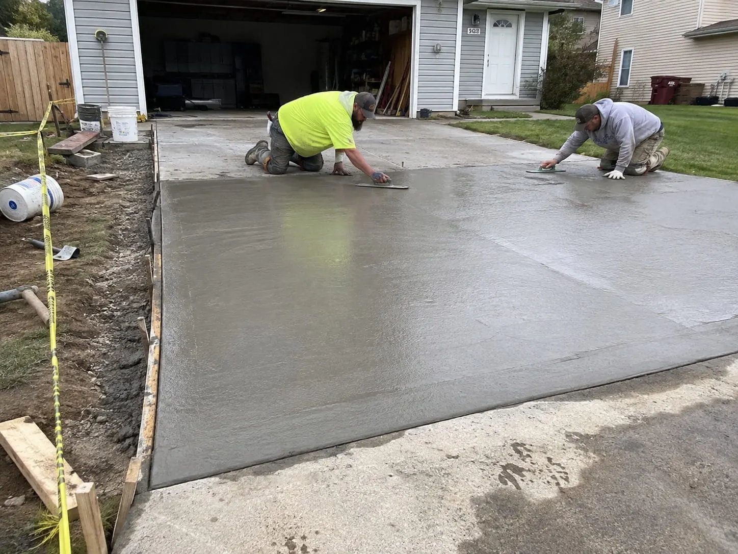 Auckland concrete contractor resurfacing a driveway