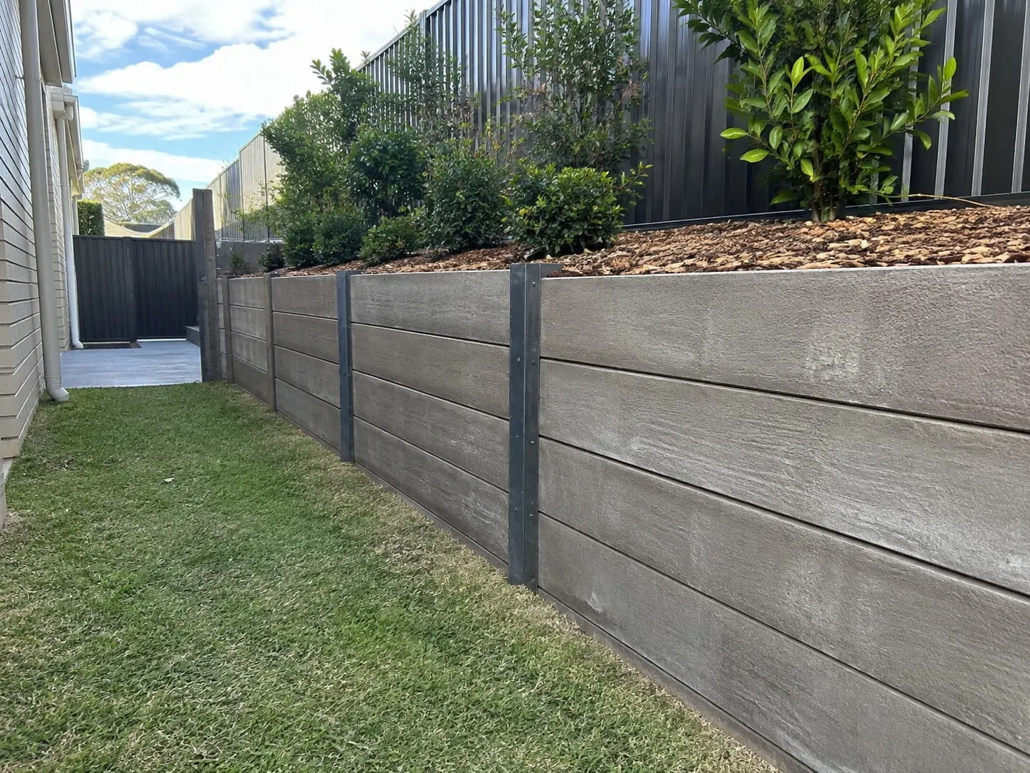 Concrete sleeper retaining wall installed in Auckland