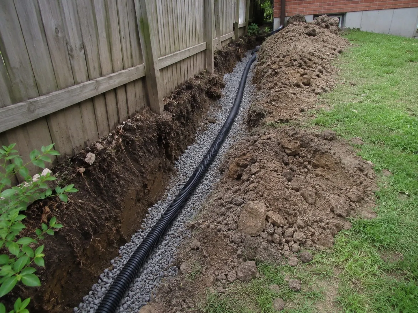 Subsoil drainage pipe laid in a trench in New Zealand